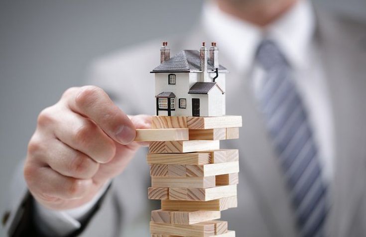 House on top of a Jenga Tower